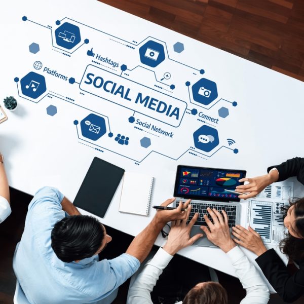 A,Dynamic,Workspace,Showcasing,Professionals,Collaborating,On,Social,Media,Strategies